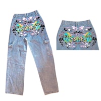 a pair of jeans with colorful designs on them